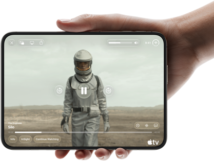 iPhone Duo, held with one hand, opened in horizontal orientation, fully unfolded, interior screen displays Apple TV show