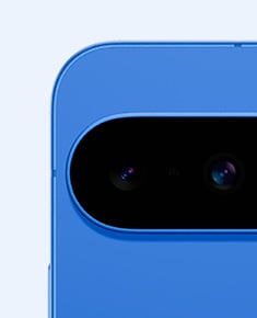 Close up of the Google Pixel 10 in Indigo showing the back of the phone and part of the camera bar