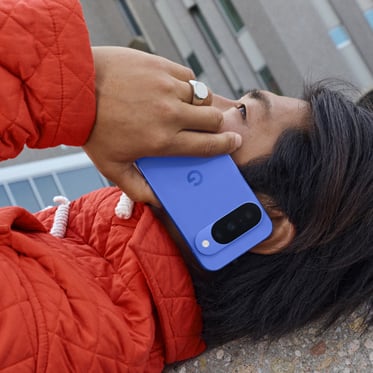 Image shows a person on the Pixel 10 in Indigo calling someone